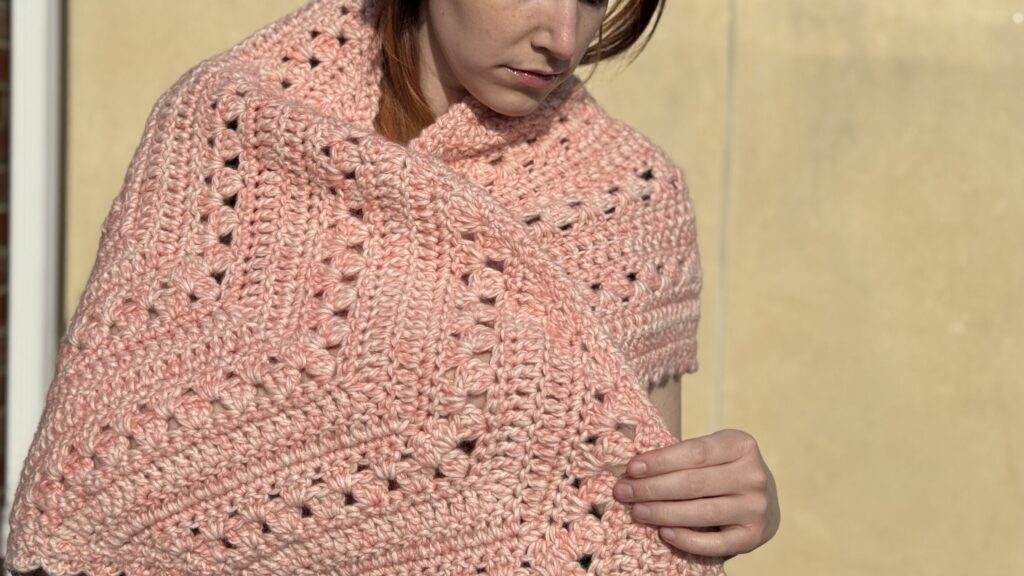 Woman modeling large pink fluffy Halfway Home on Tranquil Trails crochet Shawl