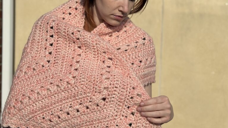 Woman modeling large pink fluffy Halfway Home on Tranquil Trails crochet Shawl