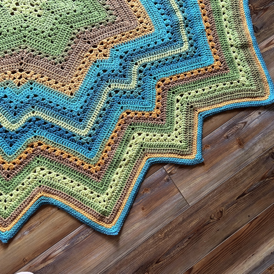 6-Day Supernova Shawl Edge Shown in Lion Brand Mandala Yarn