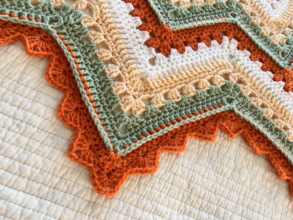 6-Day Ridgy Didge Supernova Blanket Edge shown in Lion Brand Mandala Bonus Bundle Yarn