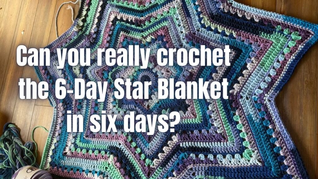 Here is a strong, descriptive alt text for your featured image: **A vibrant seven-pointed star crochet blanket in shades of blue, purple, and green laid out on a wooden floor, with overlaid text that reads: "Can you really crochet the 6-Day Star Blanket in six days?"**